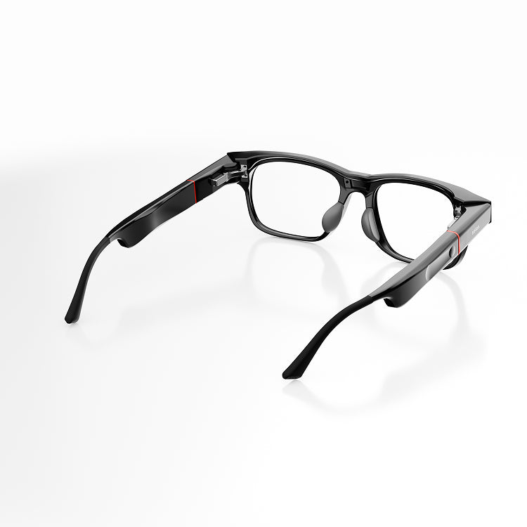 Black smartglasses with a brown transparent frame front from the back on a white background.